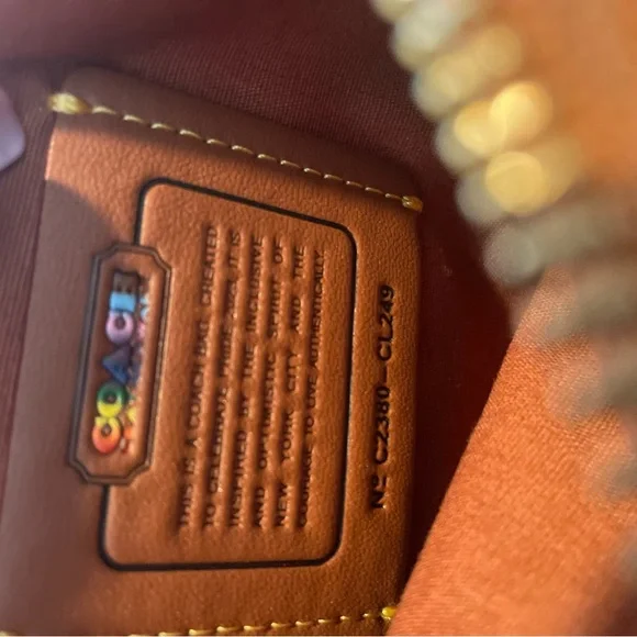 Coach Kitt Messenger Crossbody in Rainbow Signature Canvas Pride Tan - Picture 5 of 6